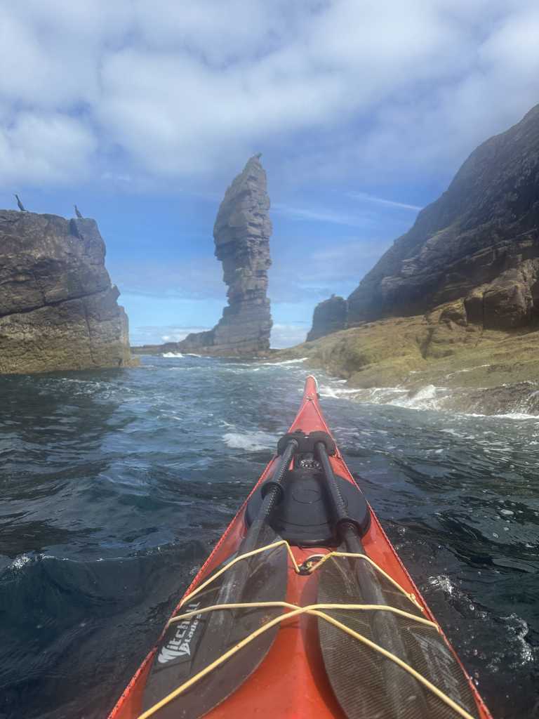 The Old Man of Stoer sea stack seen from the cockpit of a kayak